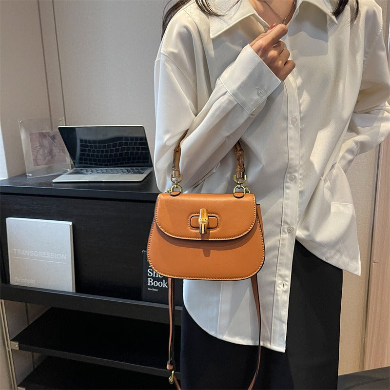 Handheld bamboo bag women's shoulder bag retro saddle bag